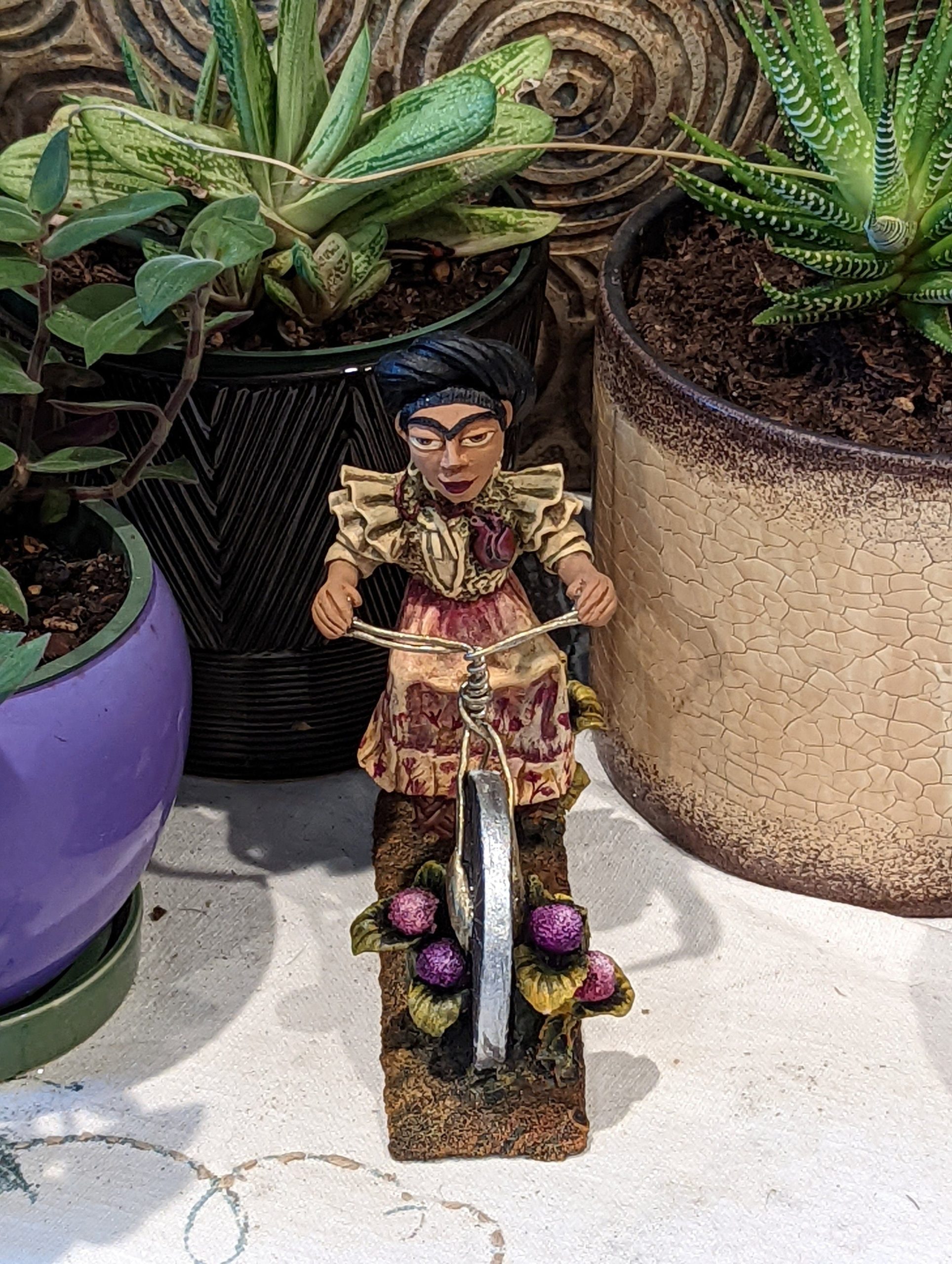 a-place-for-all-your-needs-to-get-oaxacan-woman-on-bicycle-mexican-folk-art-from-oaxaca-clay-figurine-handmade-by-juan-jose-aguilar-collectible-women-statuette-fashion_5.jpg