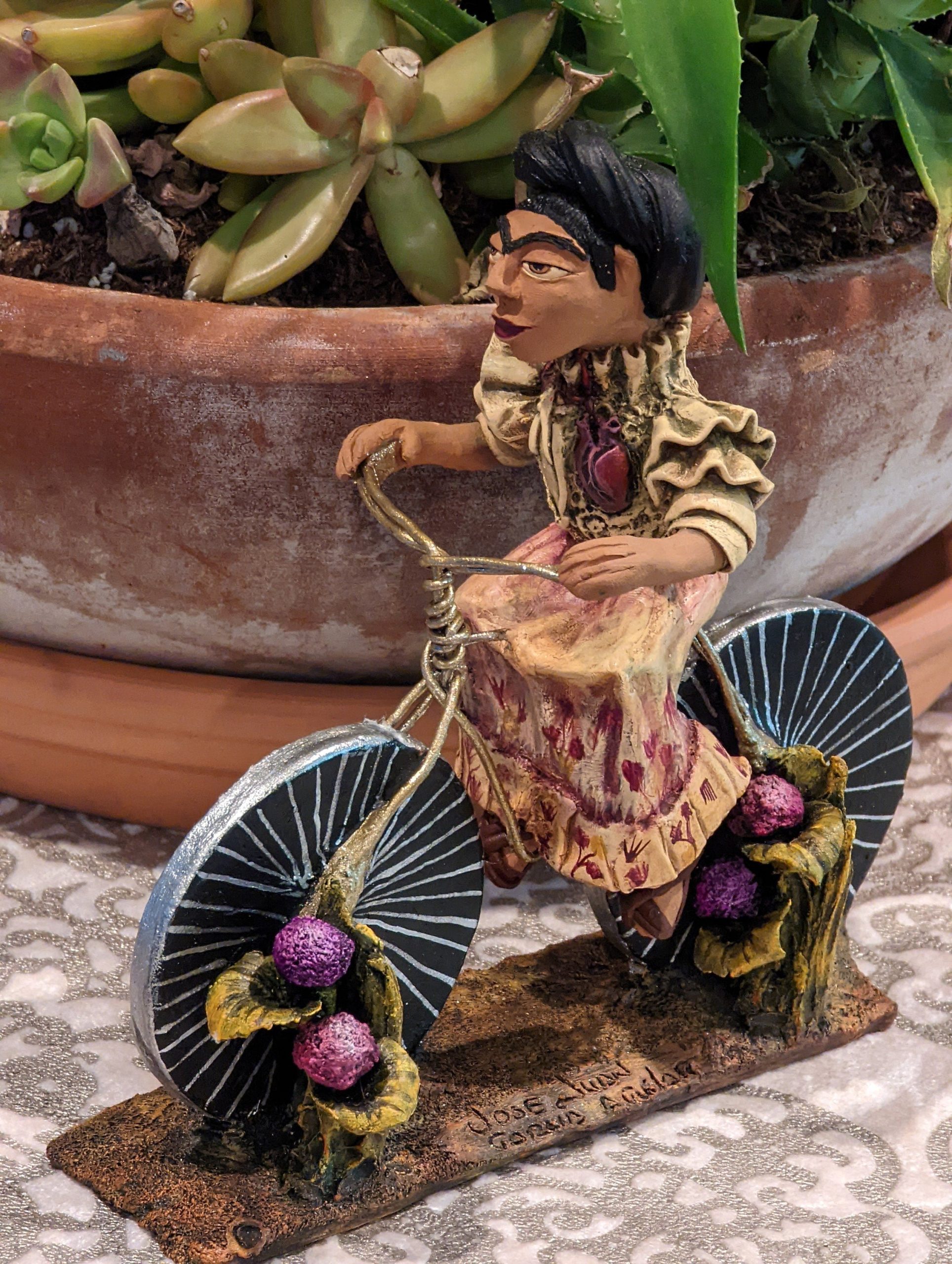 a-place-for-all-your-needs-to-get-oaxacan-woman-on-bicycle-mexican-folk-art-from-oaxaca-clay-figurine-handmade-by-juan-jose-aguilar-collectible-women-statuette-fashion_7.jpg